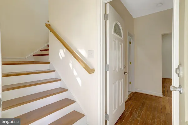 a bathroom with a sink a mirror and shower