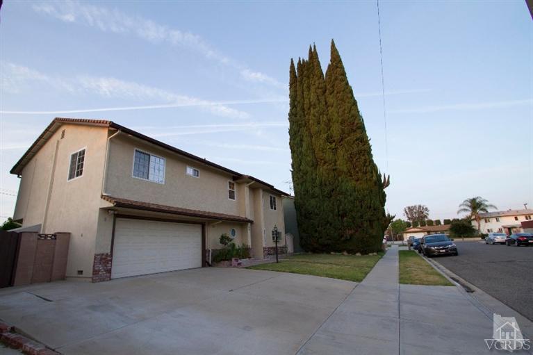 2169 Rhoda Street Simi Valley, CA 93065 - Photo 1 of 21 a view of a street with cars parked in front of it