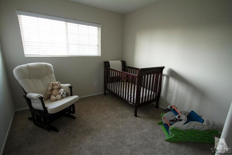 2169 Rhoda Street Simi Valley, CA 93065 - Photo 14 of 21 a living room with furniture and a window