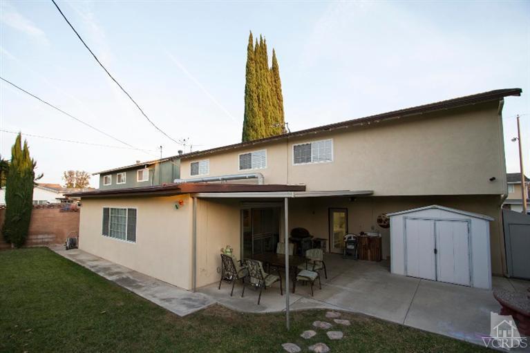 2169 Rhoda Street Simi Valley, CA 93065 - Photo 21 of 21 a view of a patio with table and chairs and potted plants