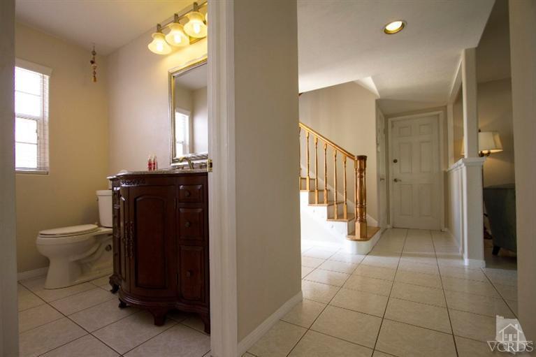 2169 Rhoda Street Simi Valley, CA 93065 - Photo 4 of 21 a bathroom with a sink and a mirror