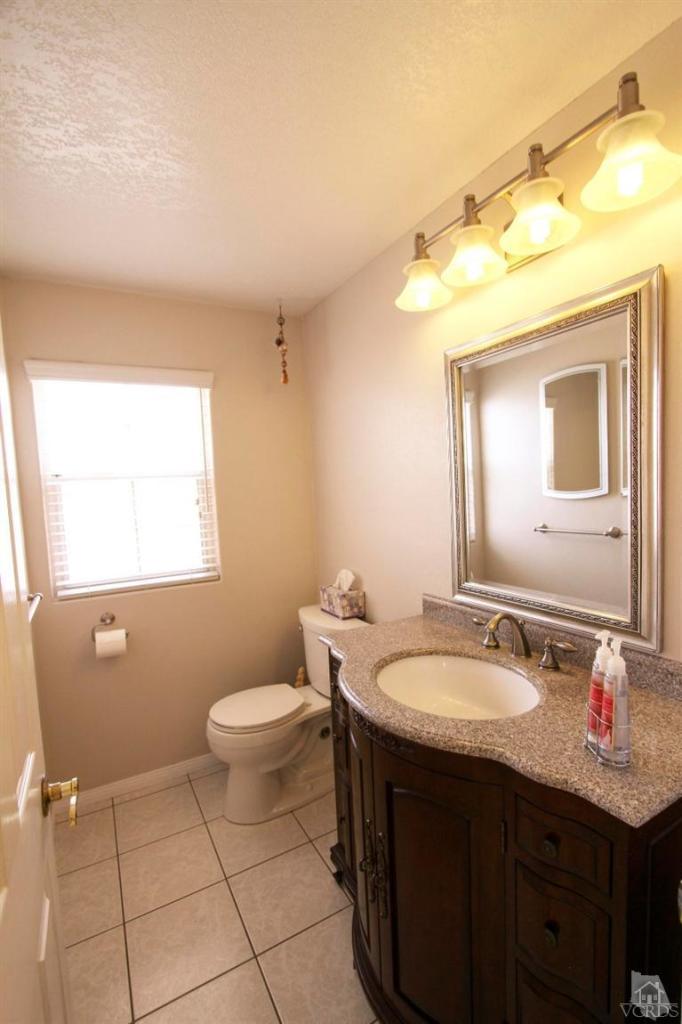 2169 Rhoda Street Simi Valley, CA 93065 - Photo 5 of 21 a bathroom with a sink and a mirror