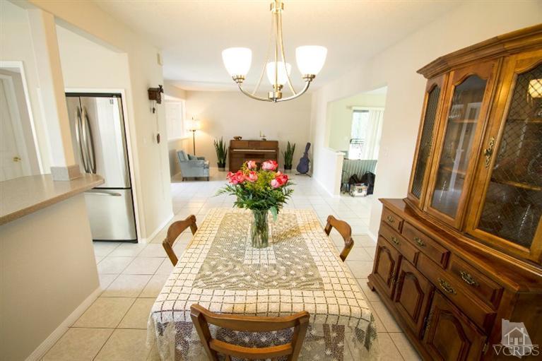 2169 Rhoda Street Simi Valley, CA 93065 - Photo 9 of 21 a vase of flowers sitting on a table