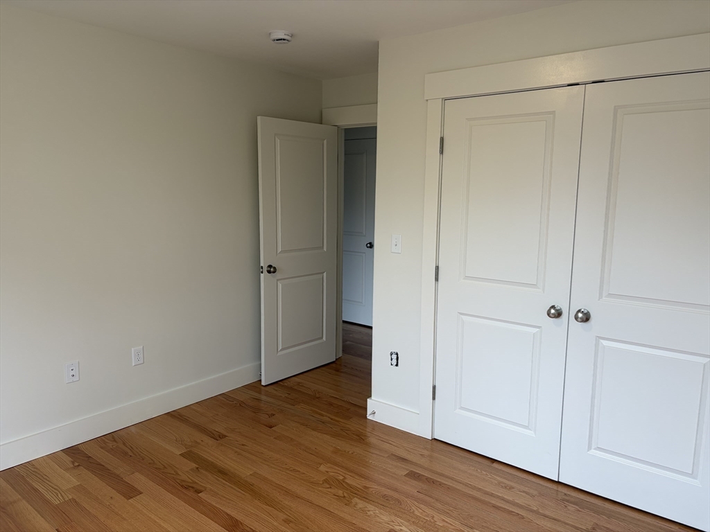 76 Valmor Street Worcester, MA 01604 - Photo 14 of 20 a view of wooden floor