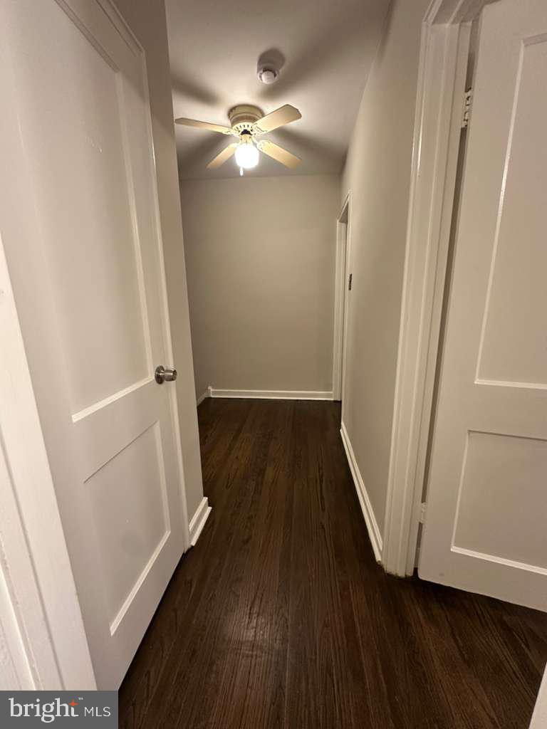 8509 Temple Road Philadelphia, PA 19150 - Photo 12 of 16 wooden floor in an empty room with a mirror