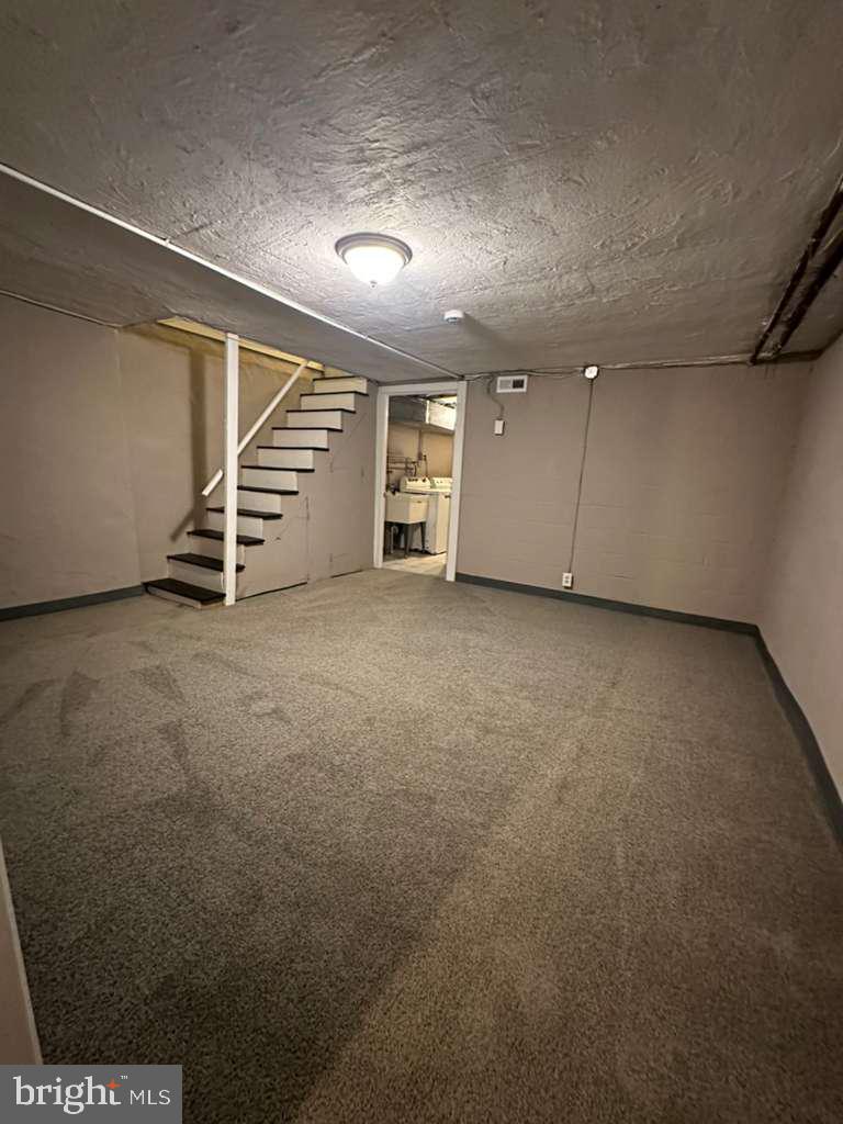 8509 Temple Road Philadelphia, PA 19150 - Photo 14 of 16 an empty room with windows