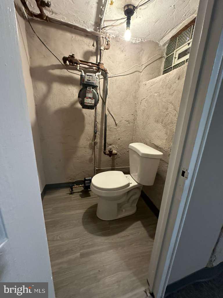 8509 Temple Road Philadelphia, PA 19150 - Photo 16 of 16 a white toilet sitting next to a shower