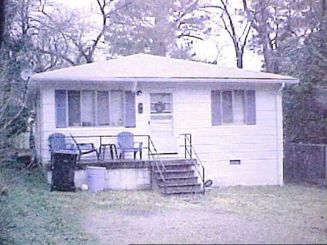727 Holden Street Raleigh, NC 27604 - Photo 1 of 1 a view of a house with a yard and sitting area