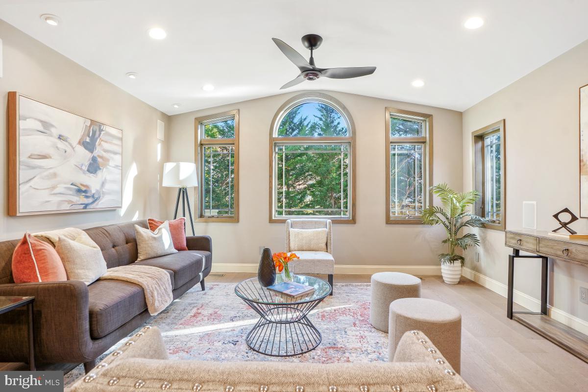 9804 Korman Court Potomac, MD 20854 - Photo 22 of 66 a living room with furniture and a large window