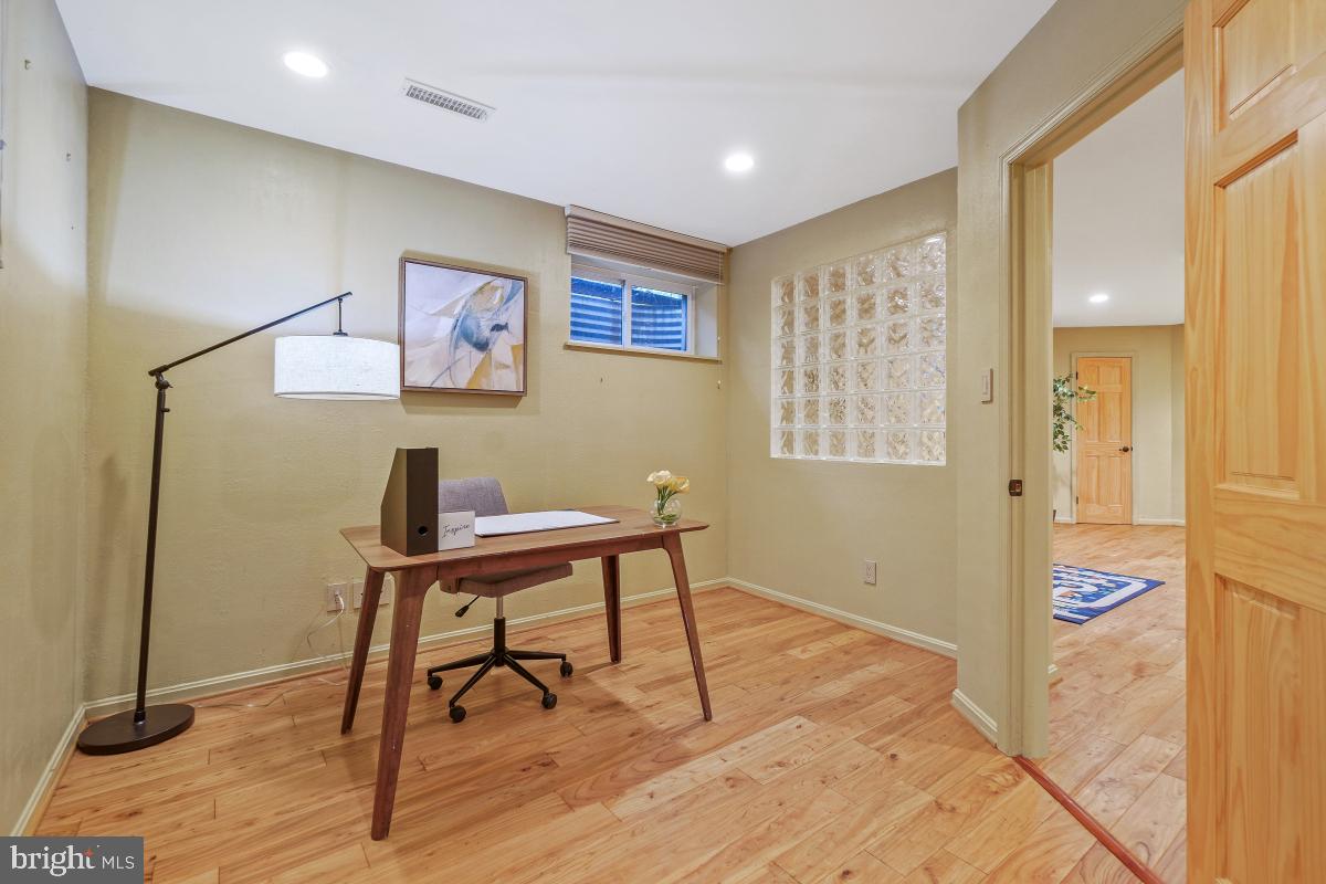 9804 Korman Court Potomac, MD 20854 - Photo 48 of 66 a view of a workspace with furniture and a window
