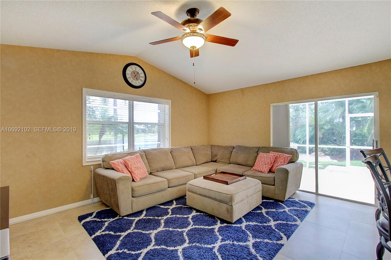 4113 Sapphire Bend Weston, FL 33331 - Photo 12 of 30 a living room with furniture and a large window