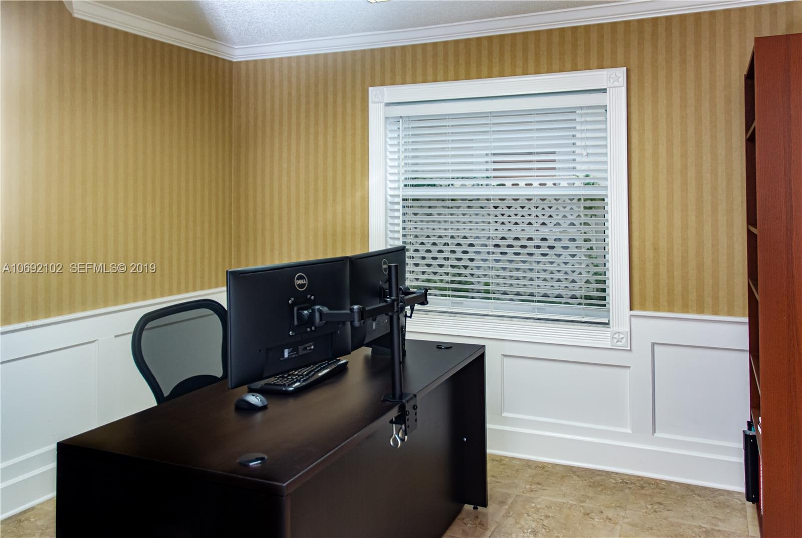 4113 Sapphire Bend Weston, FL 33331 - Photo 9 of 30 a living room with furniture and a window