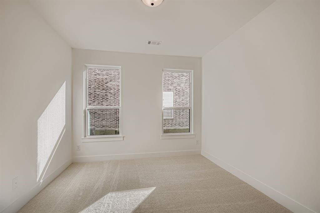 2300 Berman Street Celina, TX 75009 - Photo 17 of 29 an empty room with windows