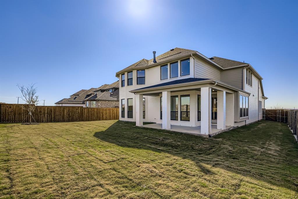 2300 Berman Street Celina, TX 75009 - Photo 28 of 29 a front view of a house with a yard