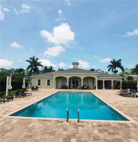a view of a house with a swimming pool