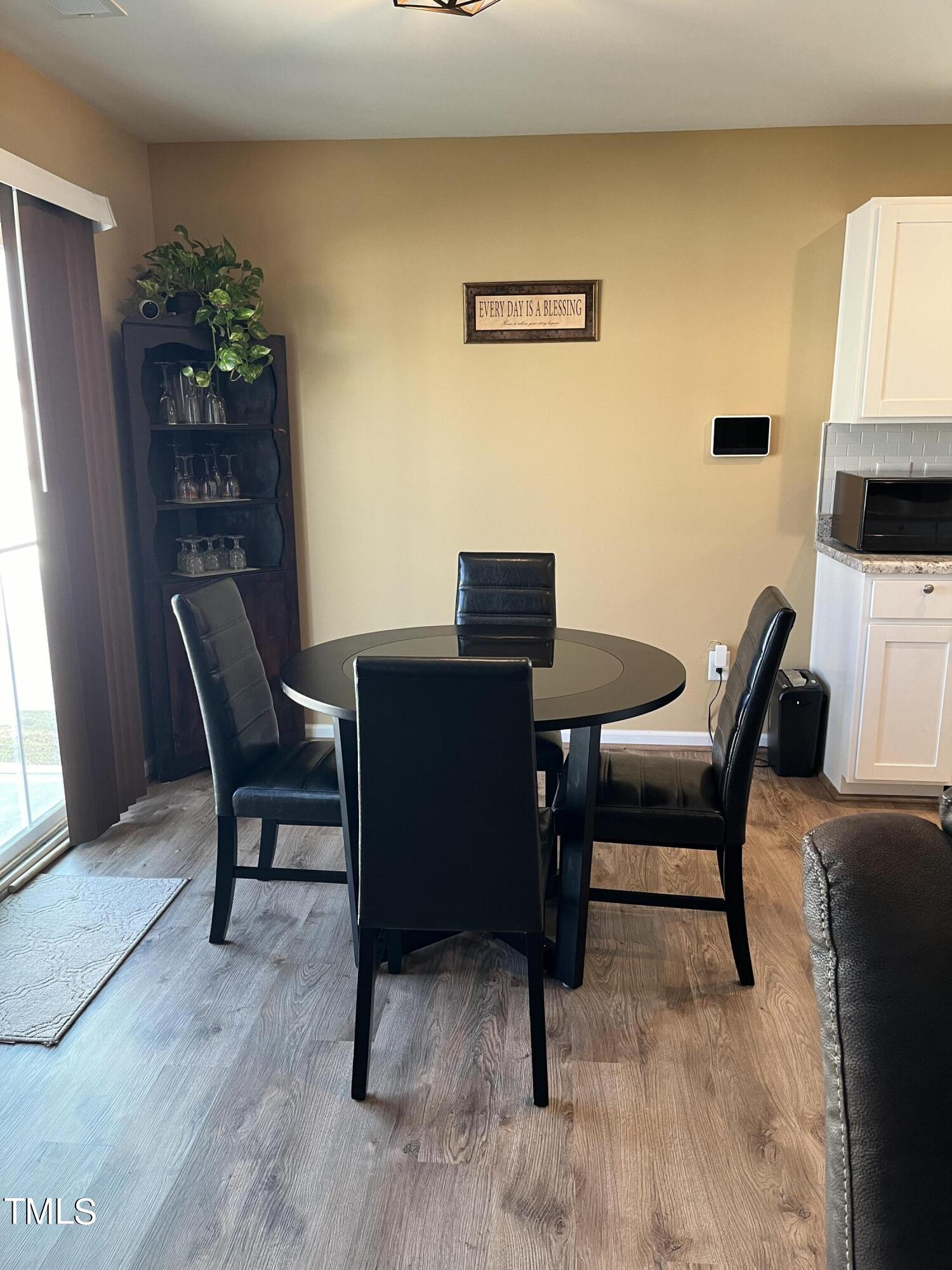 1408 Bridgewater Drive Durham, NC 27704 - Photo 35 of 41 a view of a workspace with furniture and a window