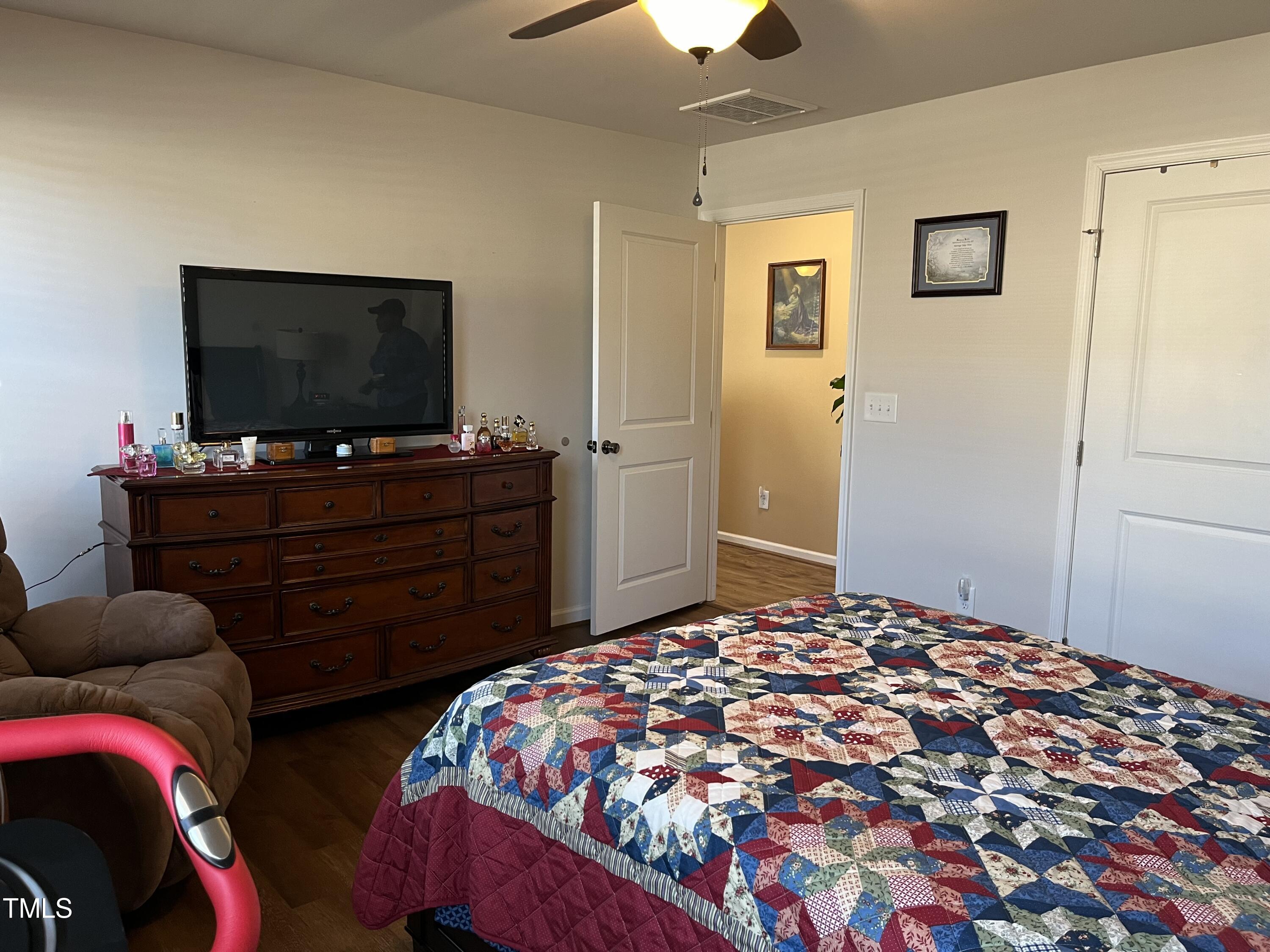 1408 Bridgewater Drive Durham, NC 27704 - Photo 39 of 41 a bedroom with two bed and a flat screen tv