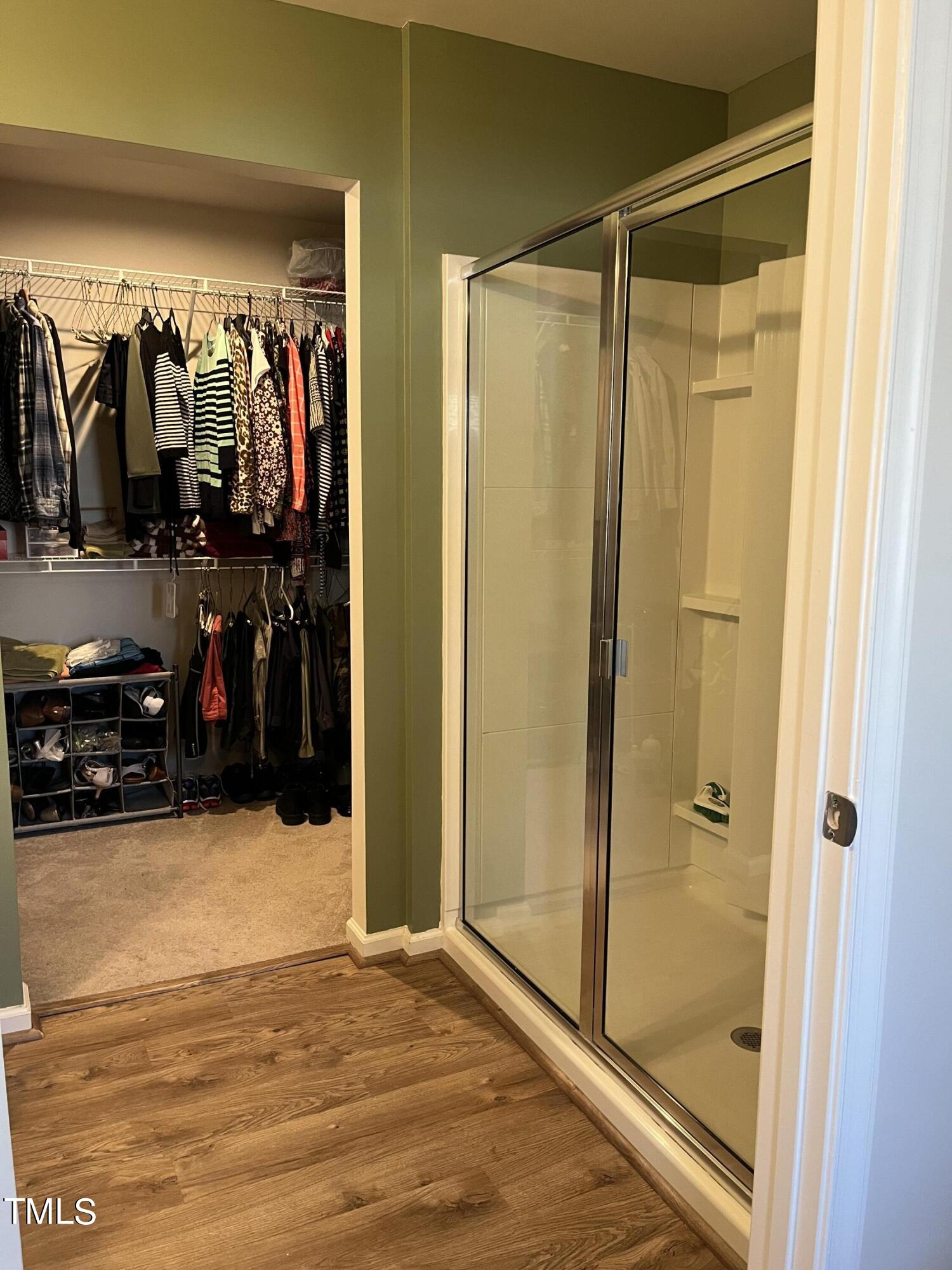 1408 Bridgewater Drive Durham, NC 27704 - Photo 40 of 41 a view of a living room with walk in closet and bathroom