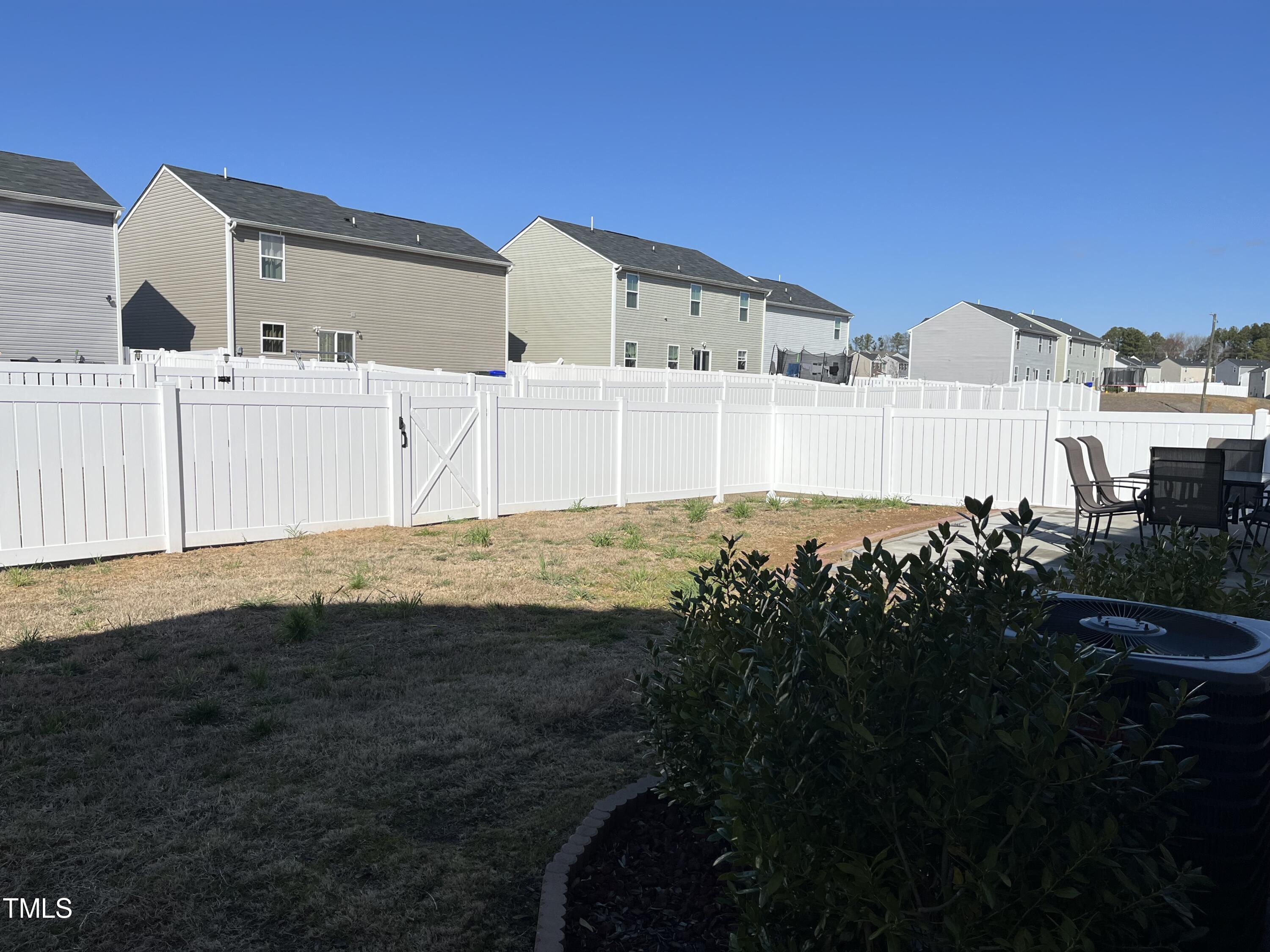 1408 Bridgewater Drive Durham, NC 27704 - Photo 7 of 41 a view of a house with a yard
