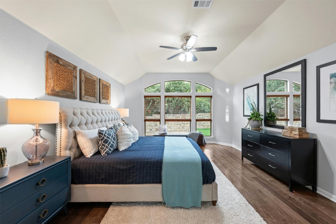 166 Briarpatch Court Austin, TX 78737 - Photo 14 of 40 a bedroom with a large bed and a window