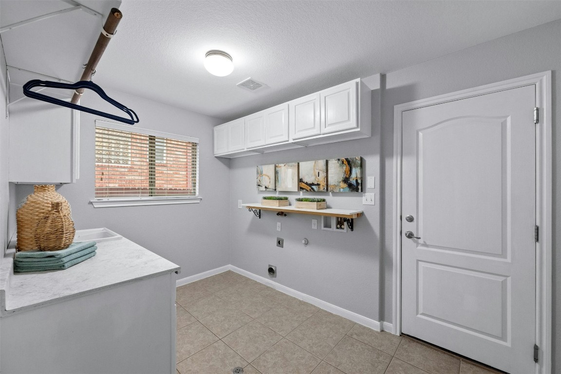 166 Briarpatch Court Austin, TX 78737 - Photo 26 of 40 a room with storage and utility