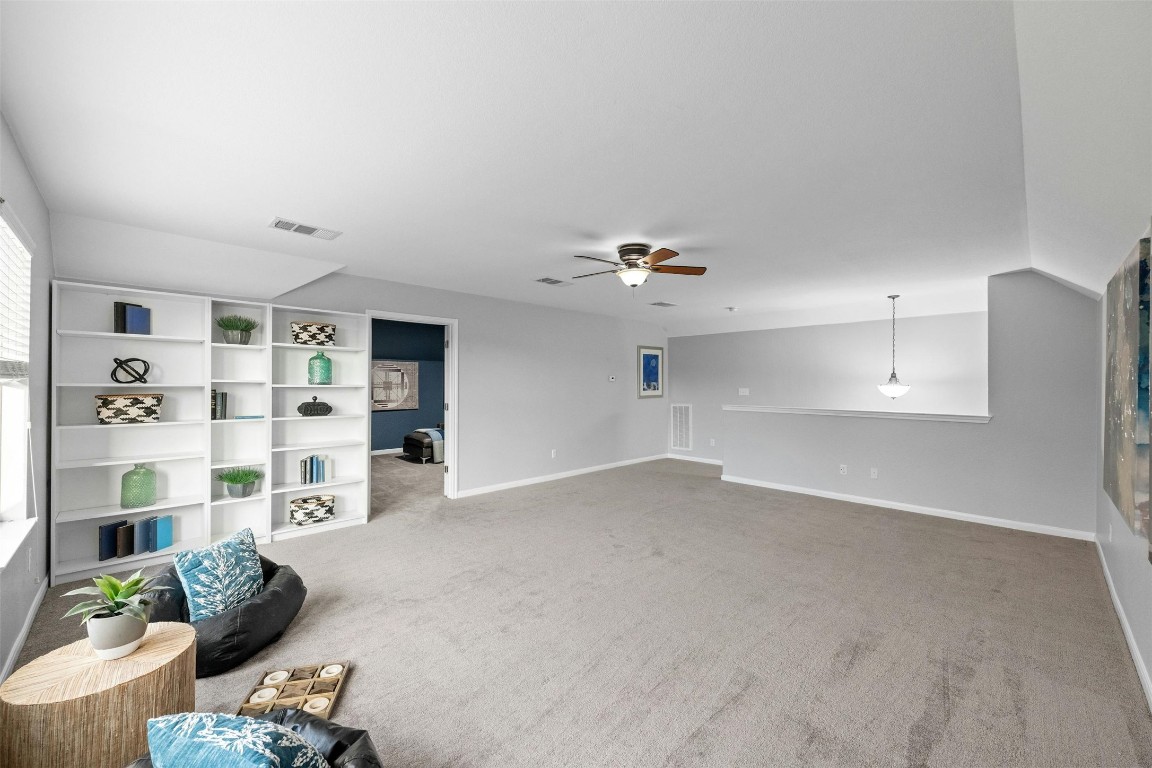 166 Briarpatch Court Austin, TX 78737 - Photo 27 of 40 a view of a livingroom with furniture and cabinet