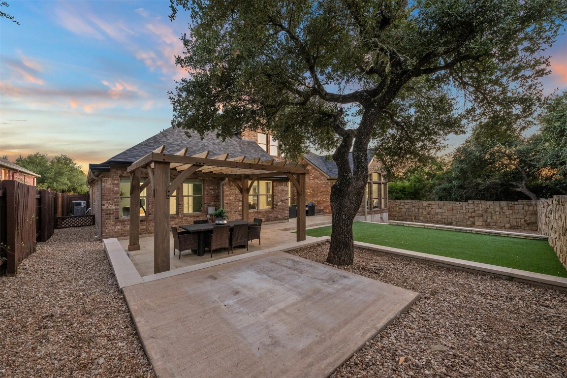 166 Briarpatch Court Austin, TX 78737 - Photo 36 of 40 a view of a house with a yard