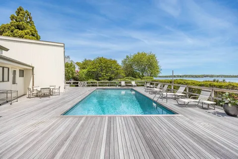 a view of a swimming pool and outdoor space