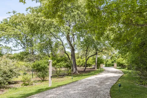 a view of lake with green space