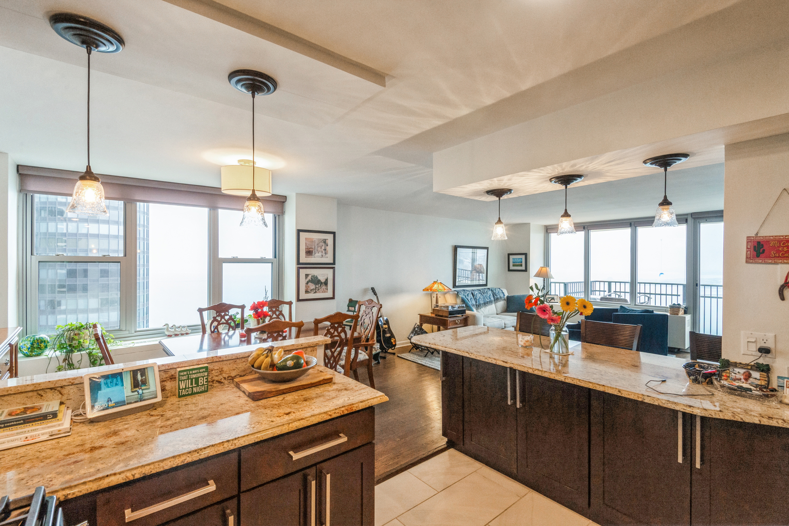400 East Randolph Street, Unit 3209 Chicago, IL 60601 - Photo 10 of 59 a kitchen with lots of counter space windows and a sink