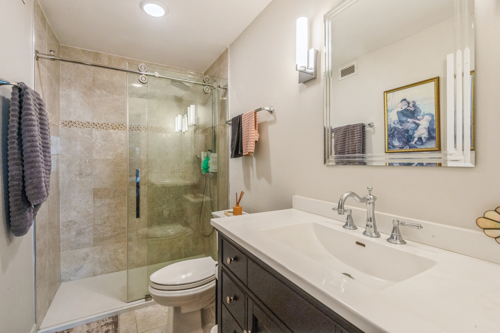 400 East Randolph Street, Unit 3209 Chicago, IL 60601 - Photo 17 of 59 a bathroom with a sink toilet and shower