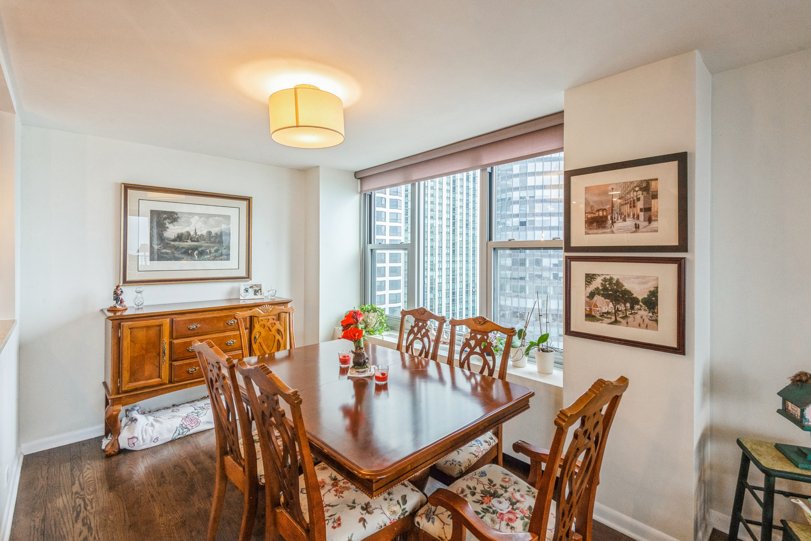 400 East Randolph Street, Unit 3209 Chicago, IL 60601 - Photo 27 of 59 a view of a dining room with furniture and a large window
