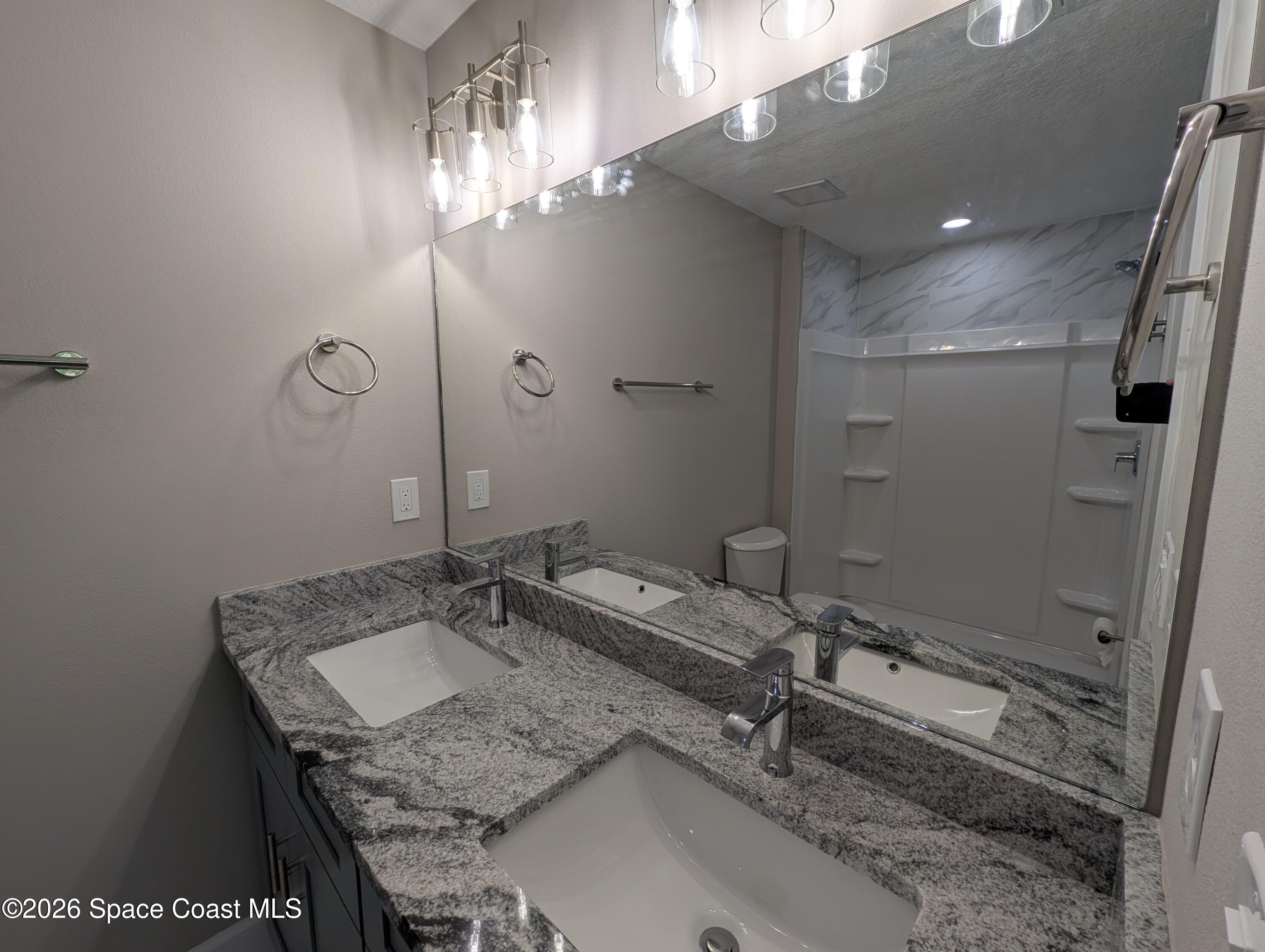 1356 Torgerson Road Southeast Palm Bay, FL 32909 - Photo 42 of 46 Primary Bedroom Vanity with double sinks