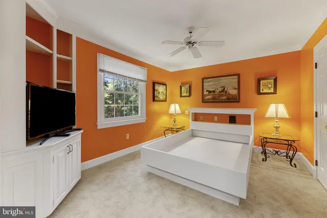 a view of a livingroom with furniture and a flat screen tv