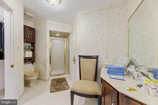 a bathroom with a sink double vanity and a mirror