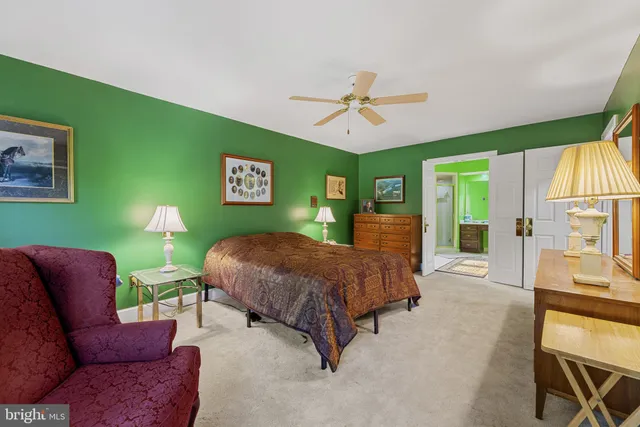 a bed room with a bed and a window