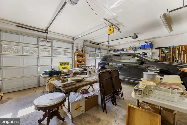 a view of a dinning table and chairs in the room