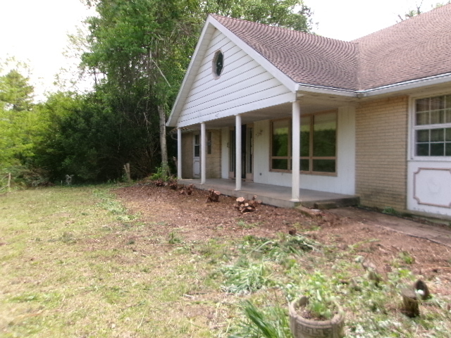 a house with yard in front of it