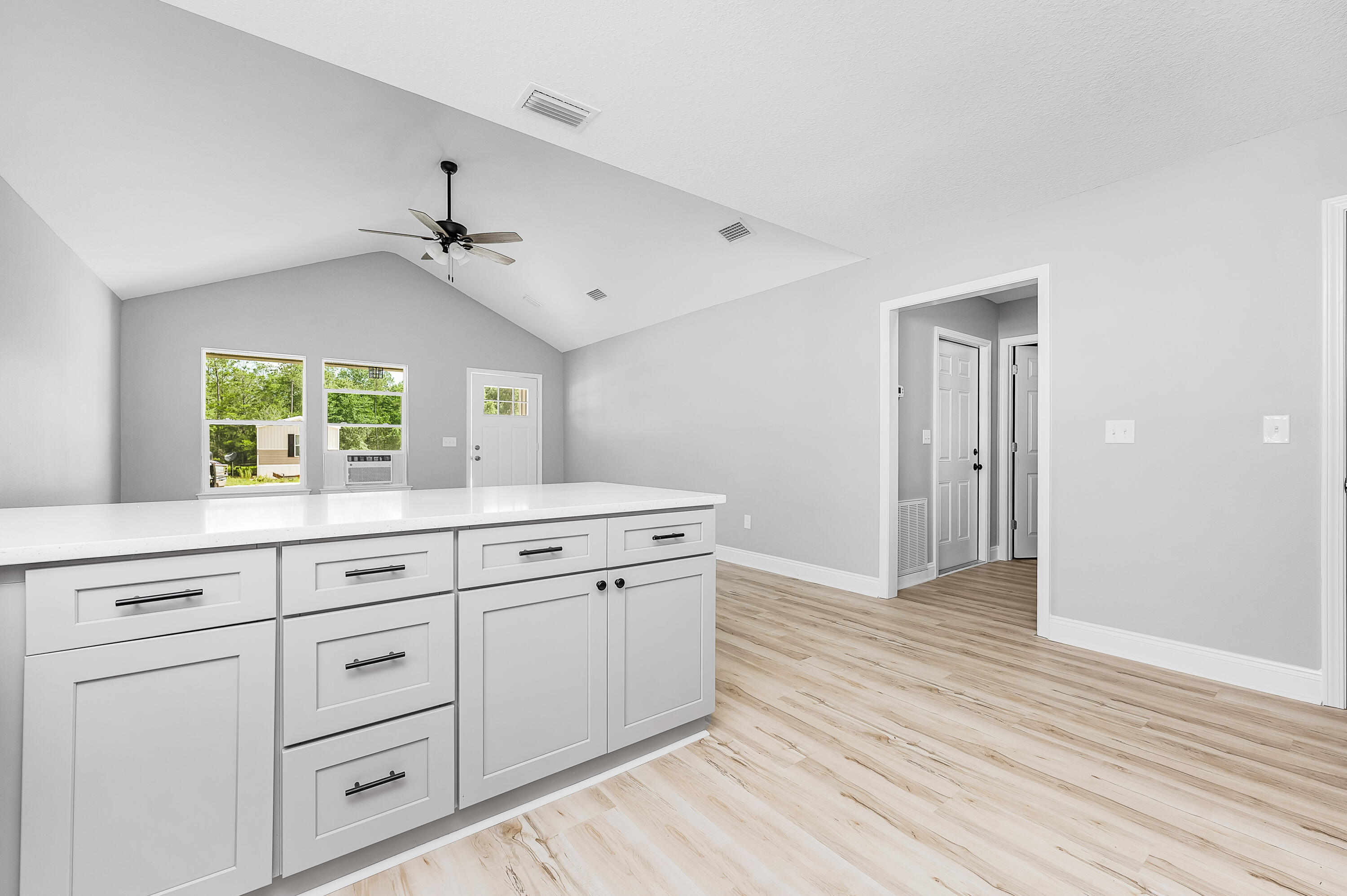 4622 Dove Way Crestview, FL 32539 - Photo 14 of 39 a view white cabinets with wooden floor
