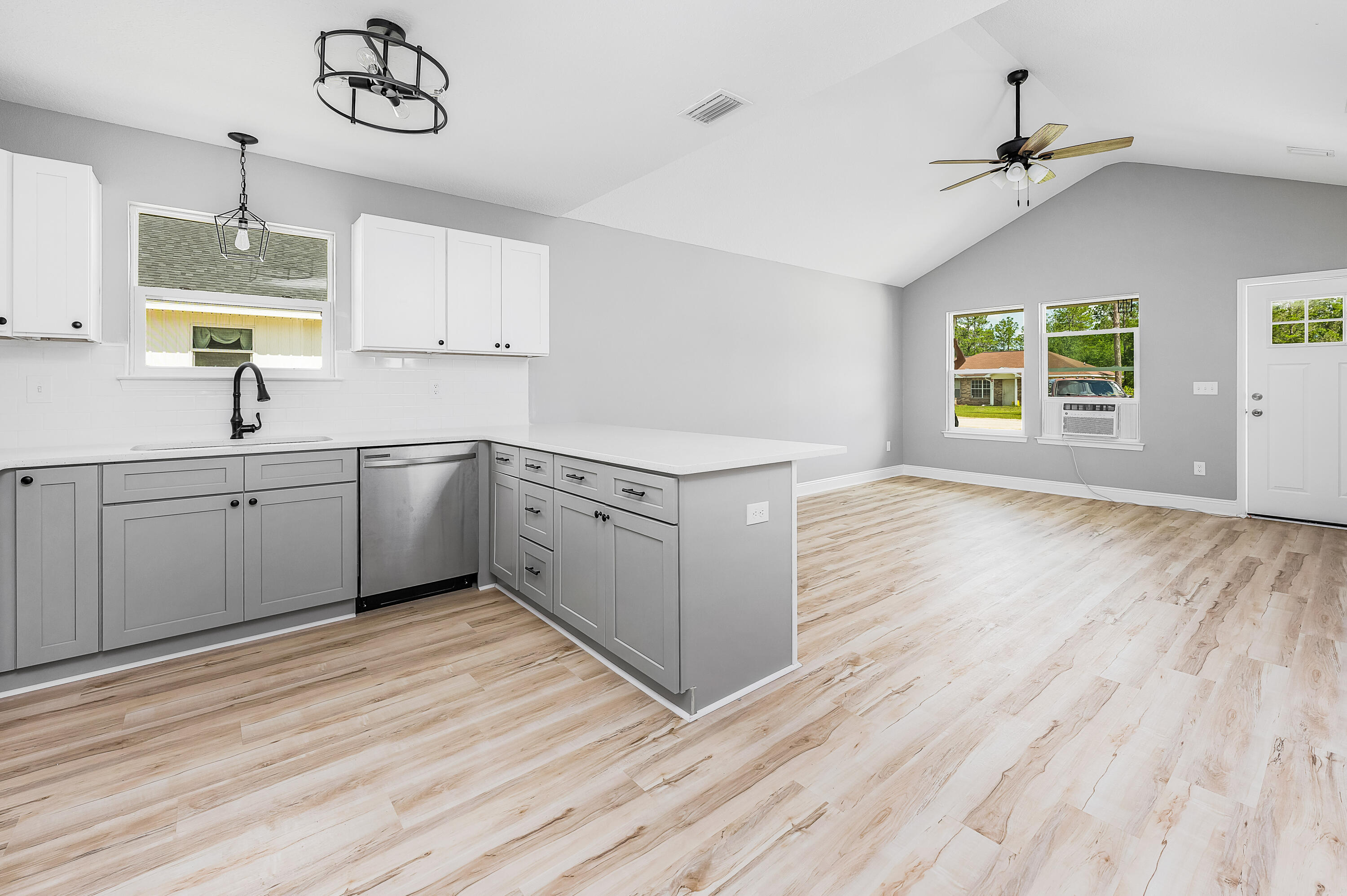 4622 Dove Way Crestview, FL 32539 - Photo 15 of 39 a kitchen with a sink cabinets and window