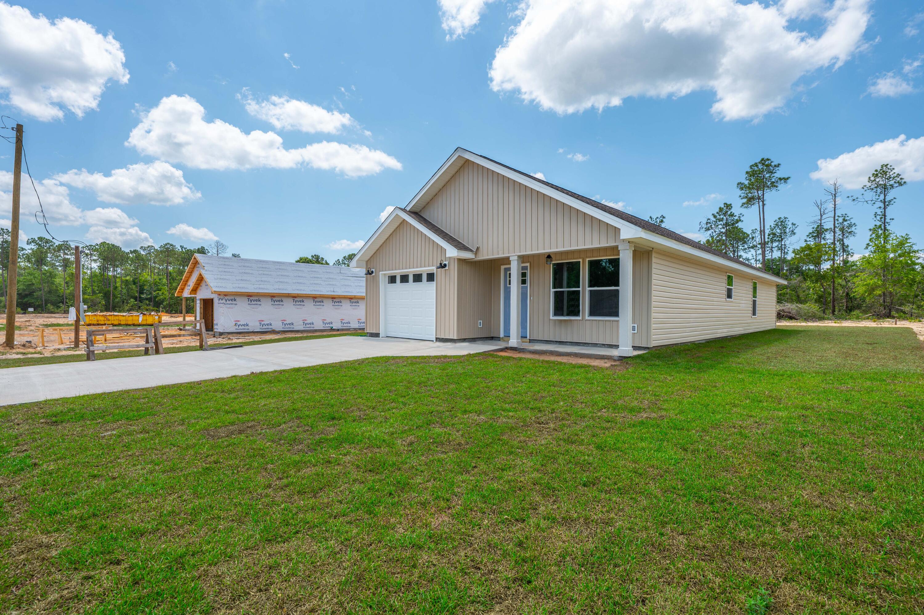 4622 Dove Way Crestview, FL 32539 - Photo 2 of 39 a view of a house with a backyard