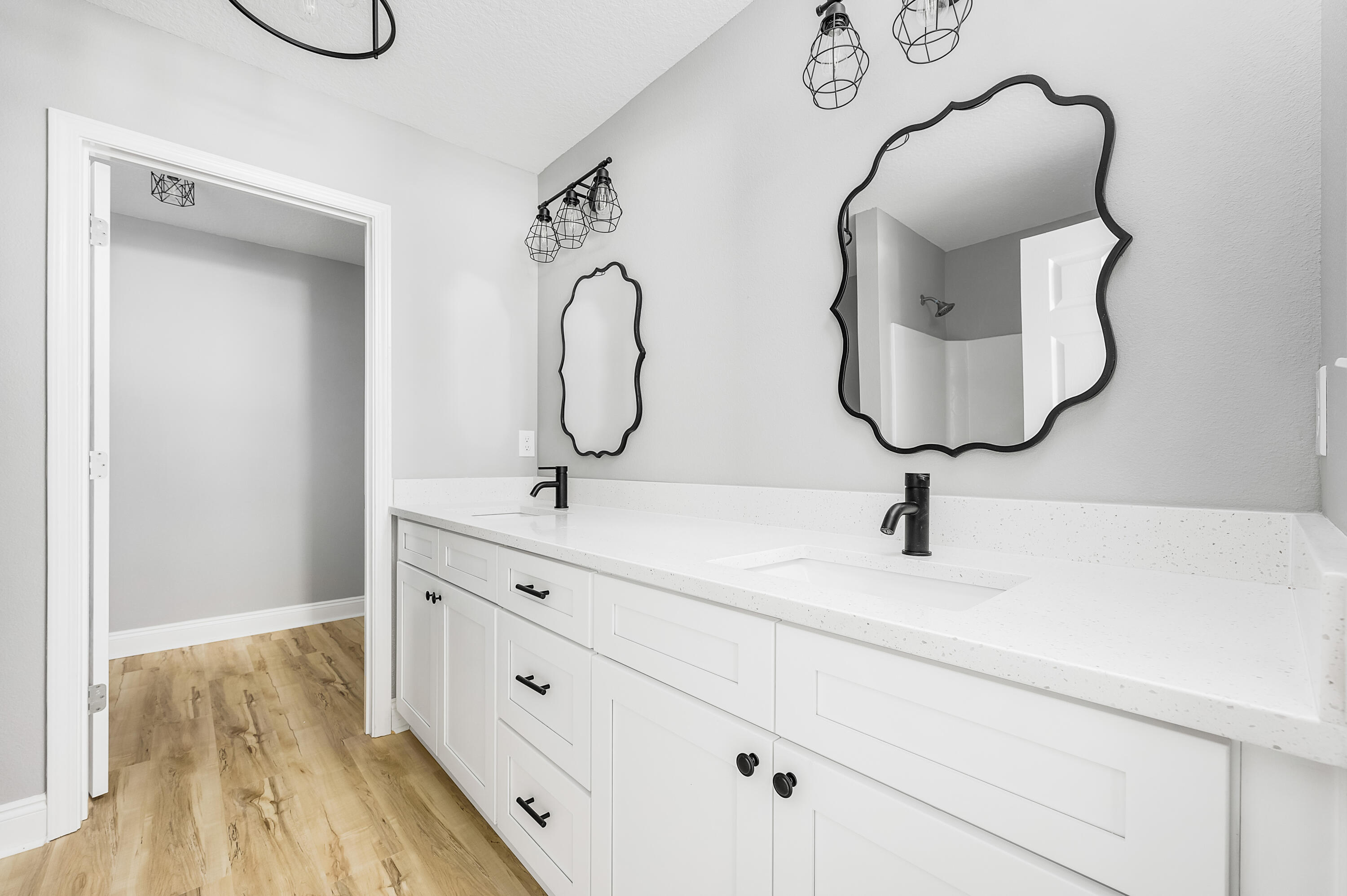 4622 Dove Way Crestview, FL 32539 - Photo 25 of 39 a bathroom with a sink and mirror