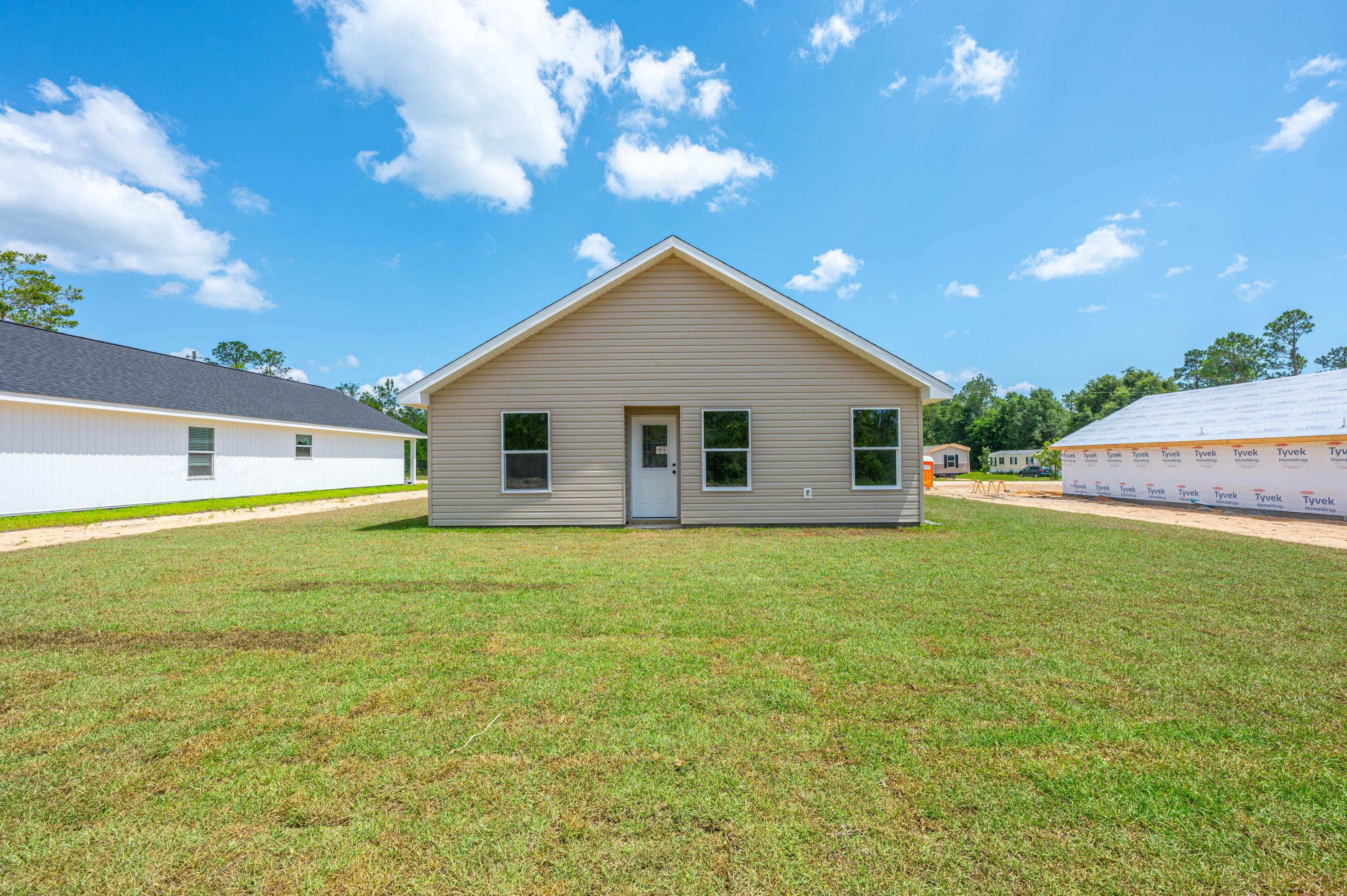 4622 Dove Way Crestview, FL 32539 - Photo 38 of 39 a view of a house with a backyard