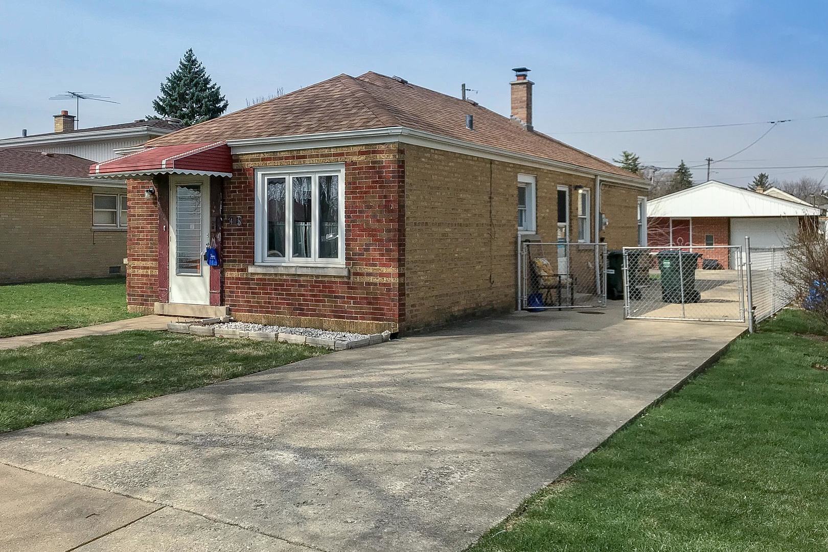 4418 Madison Avenue Brookfield, IL 60513 - Photo 1 of 1 a front view of a house with a yard