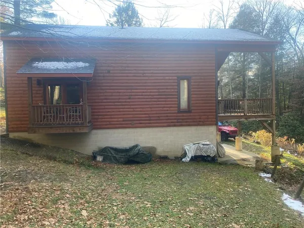 a house view with a backyard space