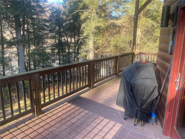a view of balcony with furniture