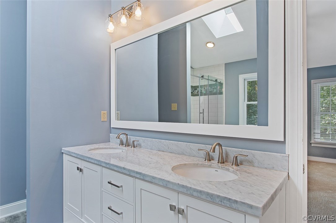 13901 Shadow Ridge Road Midlothian, VA 23112 - Photo 20 of 32 a bathroom with a granite countertop sink and a mirror