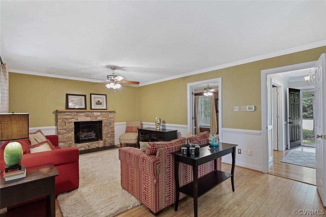 13901 Shadow Ridge Road Midlothian, VA 23112 - Photo 6 of 32 a living room with furniture fireplace and window