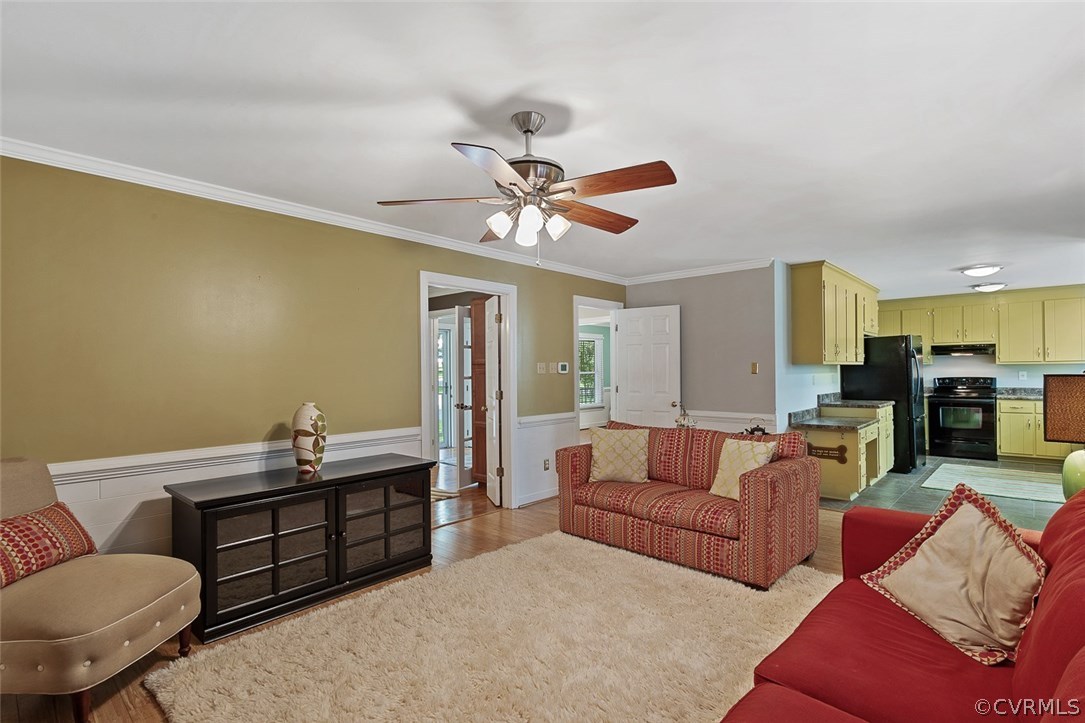 13901 Shadow Ridge Road Midlothian, VA 23112 - Photo 8 of 32 a living room with furniture and a large window