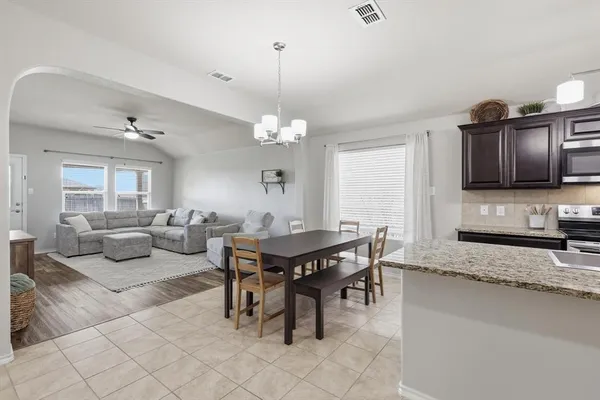 a view of a dining room with furniture